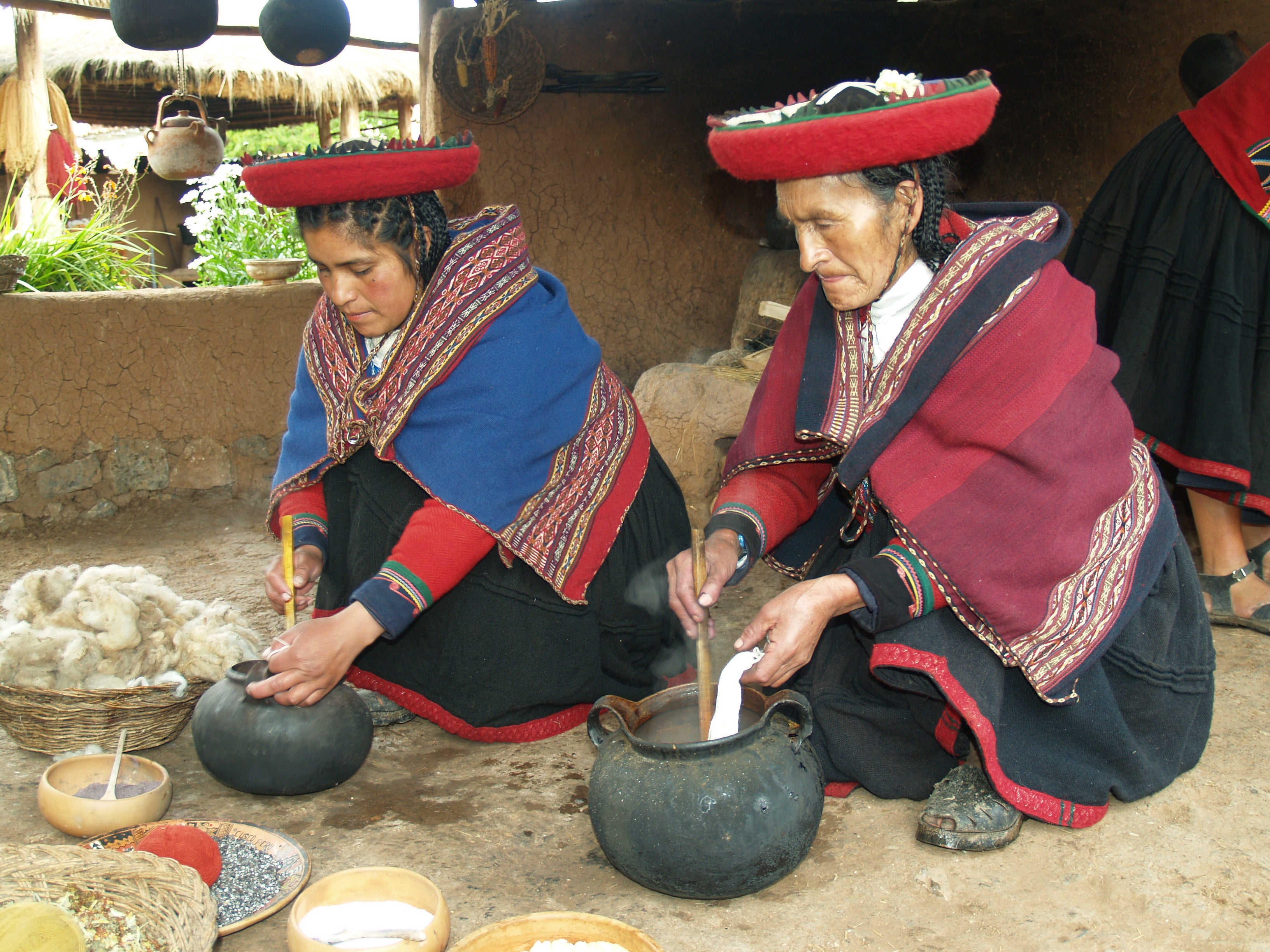 Load video: Skilled Peruvian artisans creating handmade textiles with vibrant Andean patterns and natural fibers.